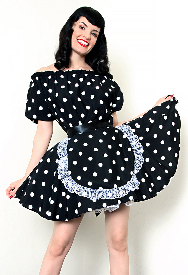 Bernie Dexter in original Versatile Fashions Elastic Maid Dress in black & white polka dot w/ white lace trim apron